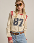 87 Embroidered Varsity Long Sleeve Top