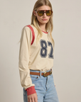 87 Embroidered Varsity Long Sleeve Top