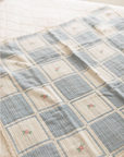 New Grain :  patchwork blanket - spring bloom
